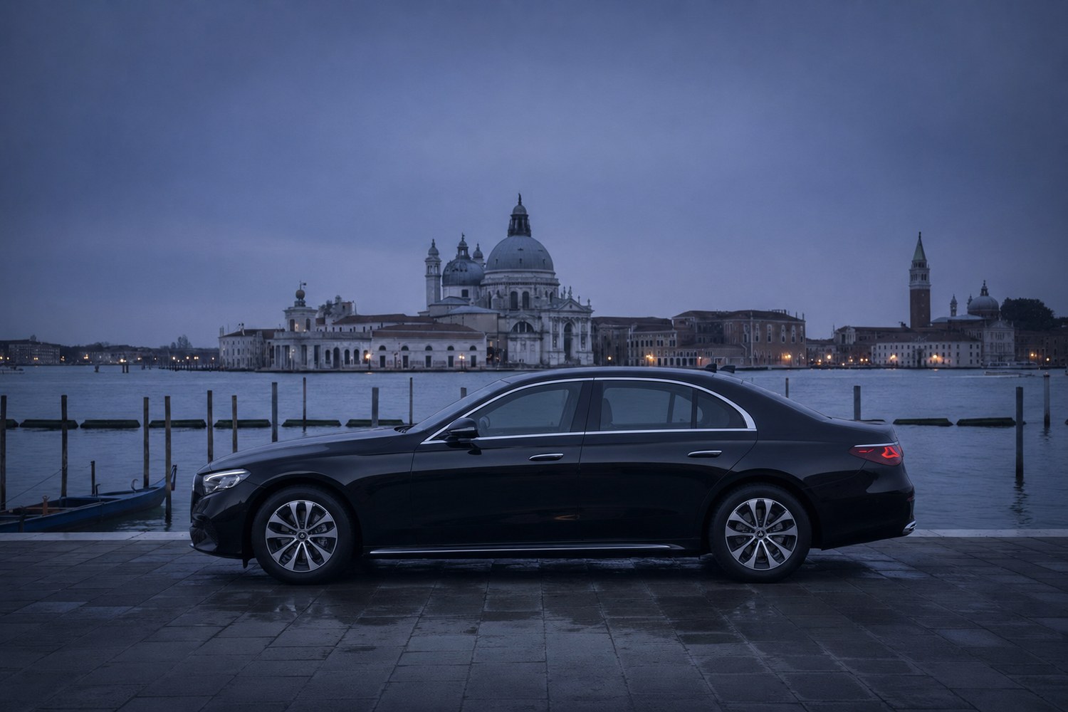 Cagnato executive sedan on the waterfront in Venice with the Basilica della Salute